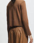 Person wearing Elodie Sweater Clove on a white background, back