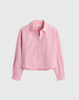 Pink shirt on a light gray background
