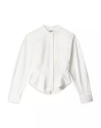 A white long-sleeve cropped blouse with a stand collar and a peplum hem, shown flat on a white background. The brand name 'XAXAR' is visible on the inner neck label.