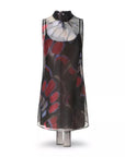 A sleeveless high-neck dress displayed on a mannequin against a white background. The dress features a sheer black mesh overlay with a colorful abstract butterfly-wing style print in red, blue, and gray over a black base.