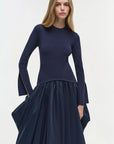 Kenlie Taffeta Knit Midi Dress on a model with a white background