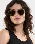 Krewe Brando Champagne Iberia Polarized on heart face shape, female model