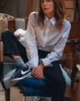 Cissa the Raw Edge Western Shirt model sitting