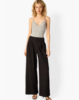 Amani Rib Knit Bodysuit with black pant, full body front