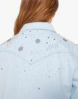 Light blue denim jacket with decorative studs on a white background