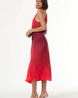 Woman wearing a red dress on a white background