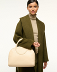 Staud Maude Bowler Bag on arm