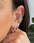 Adina Reyter London Pave Spike Huggie on ear