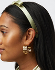 Lele Sadoughi Greek Key Hoop Earring on model