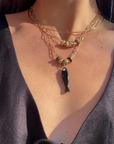Thatch Fortuna Onyx Charm on model with other charms