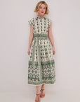 woman wearing a matching floral set on a white background