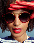 Krewe STL Nylon Cherry 18k Sunglasses close up, on heart face shape, female model