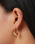 Jenny Bird Padlock Heart Earrings on ear