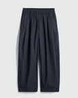 navy pants on a light gray background