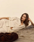 Santorini Stripe Shirt on model laying down