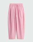 Pink pants on a light gray background