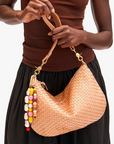 Clare V Moyen Messenger Woven Checker Bisque close up with charm