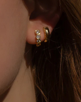 Thatch Astrid Hoop Earring on ear with other earring