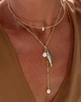 Thatch Fortuna Green Dot Charm on model on lariat