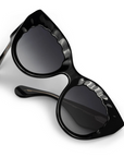 Krewe Charlotte Black + Black Crystal Sunglasses close up by itself