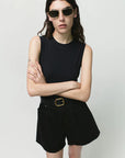 Rhoda Short with belt and black tank