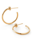 A pair of gold-plated open hoop earrings with a small spherical bead detail at the post, shown on a clean white background.