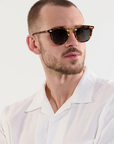 Krewe Beau II Kyoto Tortoise 18k Polarized Sunglasses on square face shape, male model