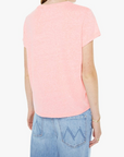 Woman wearing a pink t-shirt and blue jeans on a white background