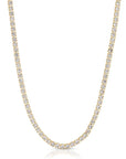 Gold necklace with clear stones on a white background