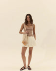Ithaca Knit Top full body front with shopping bag