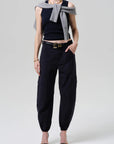 Nova Tank in Navy full body view with sweater over shoulder