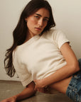Noa Sweater model laying down