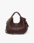 Brown leather handbag with gold accents on a white background
