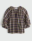 plaid vneck short sleeve top on a grey background