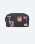 Navy blue bag with patches on a white background