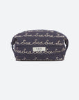 A navy blue quilted cosmetic pouch with an all-over beige script pattern reading 'Sea', featuring a small white brand label on the front.