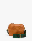 woven bag with green bag strap