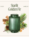 Green candle jar with pine branches and pinecones on a white background, labeled 'Starlit Golden Fir'.