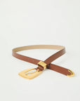 A brown leather belt with a polished gold-tone buckle, presented on a clean white background.