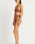 Model size XS wearing Celeste One Piece in Fawn Shimmer, side