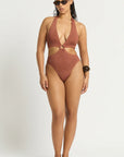 Model size M wearing Celeste One Piece in Fawn Shimmer, front