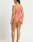 Model size M wearing Lotus Brief in Coral Pink and Lotus Crop in Coral Pink, back