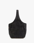 Black woven handbag on a white background