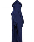 photo of a dark blue ruffled dress on a white background