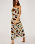 Woman wearing a floral dress on a white background