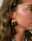 Tripla Hoop Earrings on model close up