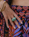 Lizzie Fortunato Monument Ring in Sage on middle finger