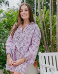 Woman wearing a Bandana Print Button Down standing outdoors with greenery in the background