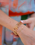 Mignonne Gavigan Martina Cuff on wrist