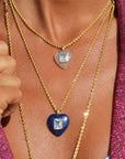 Pink Quartz Heart Pendant stacked with other necklaces